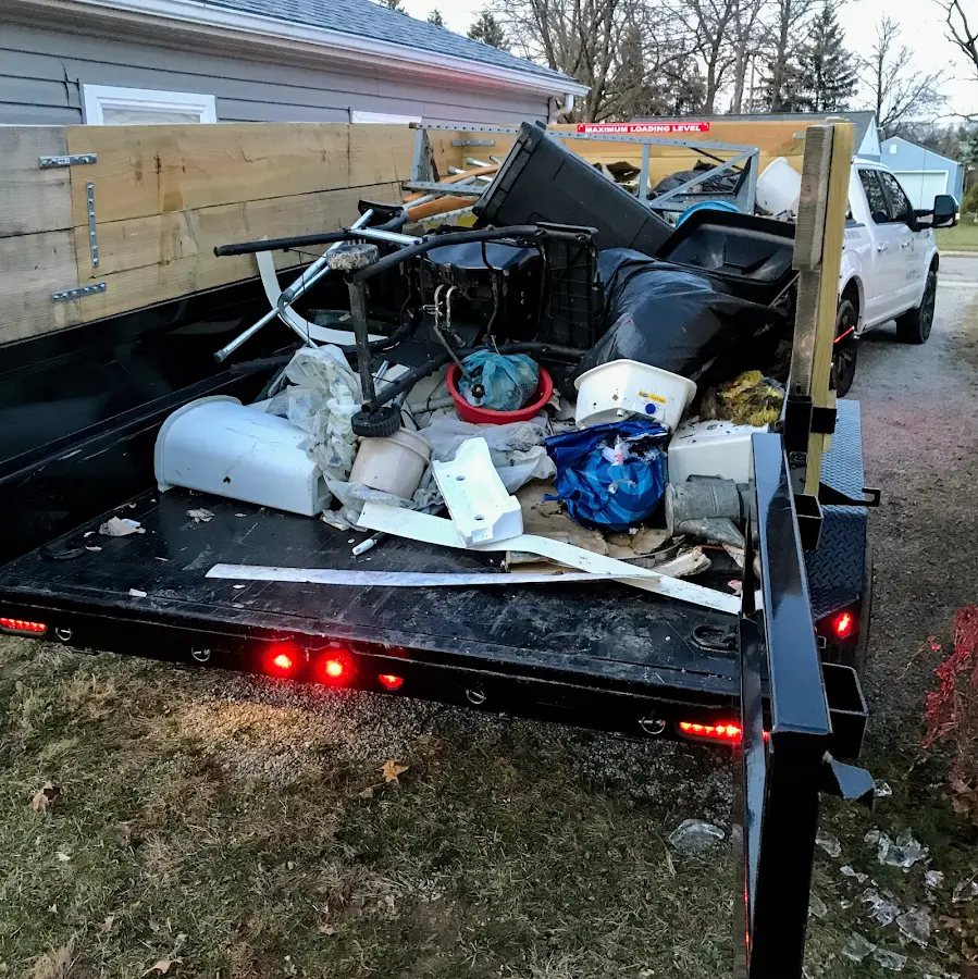 Roll-off dumpster delivered to a residential driveway in Rochester